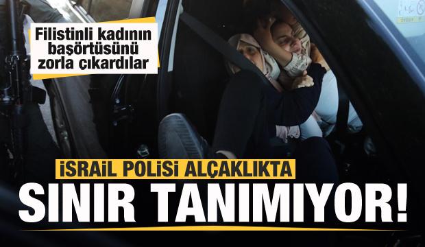 İsrail polisi Filistinli kadının başörtüsünü çıkardı