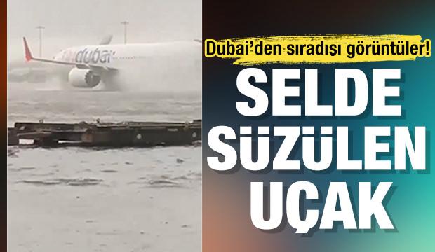 Dubai'deki havalimanı sele teslim oldu! Uçakların zor anları kamerada