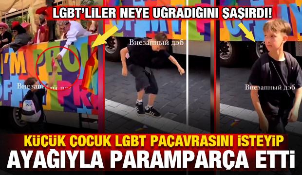 Küçük çocuk LGBT destekçilerini dumura uğrattı! LGBT paçavrasını ayağıyla paramparça etti