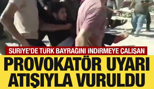 Suriye'de Türk bayrağını indirmeye çalışan provokatör uyarı atışıyla vuruldu
