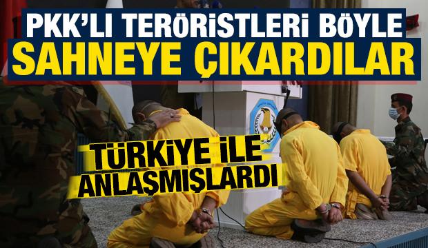 Türkiye ile anlaşmışlardı: PKK'lı teröristleri böyle sahneye çıkardılar...