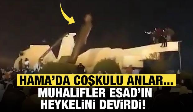 Suriye'de muhalifler Hama’daki Hafız Esad heykelini devirdi!