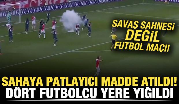 Savaş sahnesi değil futbol maçı! Sahaya patlayıcı madde atıldı! Dört futbolcu yere yığıldı