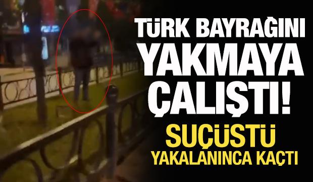 Türk bayrağını yakmaya çalıştığı öne sürülen şüpheli, bir kadından tepki gösterince kaçtı