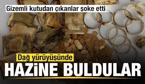 Dağ yürüyüşünde altın hazinesi buldular! Gizemli kutudan çıkanlar şaşkına çevirdi