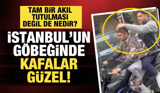 Sultangazi'de seyir halindeki motosiklet üzerinde tıraş