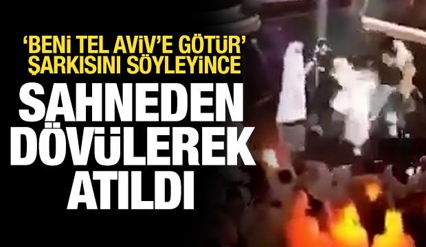 Umman'da 'Beni Tel Aviv'e götür' şarkısını söyleyen şarkıcı sahneden dövülerek atıldı