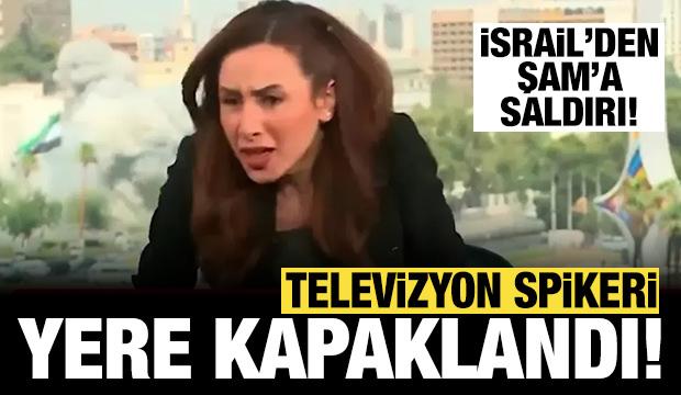 Şam'ın bombalanma anı kamerada: Sunucu bombanın etkisiyle yere düştü!