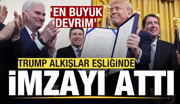 Trump alkışlar eşliğinde imzayı attı: En büyük devrim
