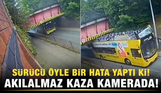 Yolcu otobüsünün tavanı köprüye çarptı! Feci görüntüler İngiltere'den