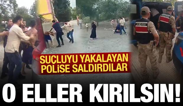 Hapis cezasıyla aranan şahsı yakalayan polislere taşlı saldırı