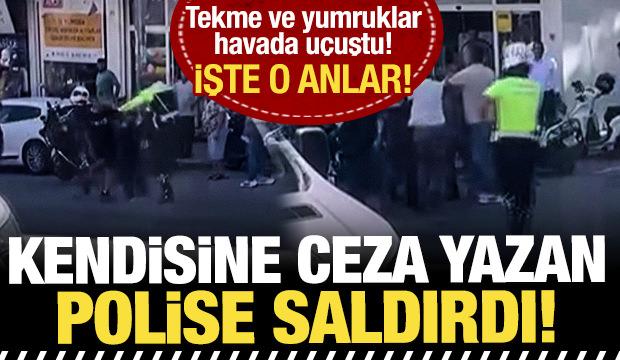 Kendisine ceza yazan polise tekme attı! 