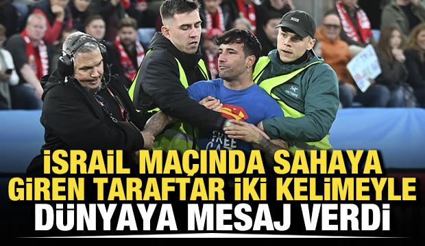 İsrail maçında sahaya giren taraftar iki kelimeyle dünyaya mesaj verdi