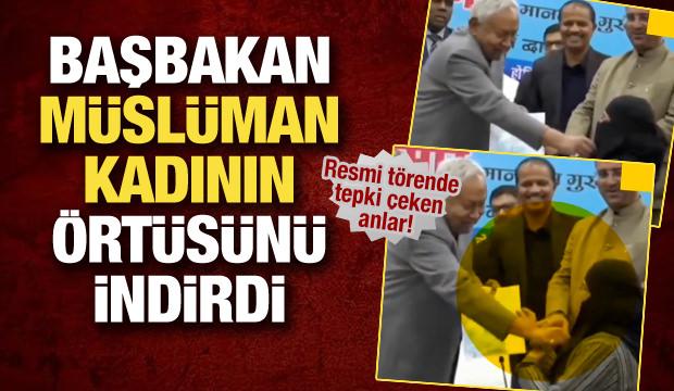 Başbakan M&uuml;sl&uuml;man kadının &ouml;rt&uuml;s&uuml;n&uuml; indirdi! Hindistan'da tepki &ccedil;eken anlar