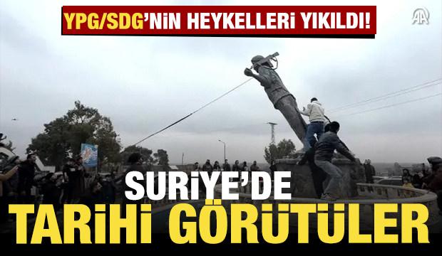 Suriye'de tarihi g&ouml;r&uuml;nt&uuml;ler: Ter&ouml;r &ouml;rg&uuml;t&uuml; YPG/SDG'nin heykelleri yıkıldı