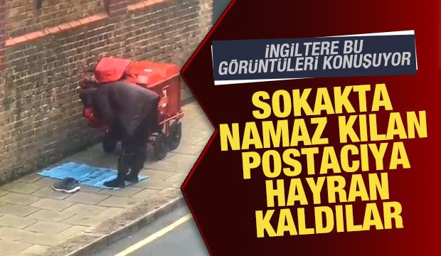 İngiltere bu g&ouml;r&uuml;nt&uuml;leri konuşuyor! Sokakta namaz kılan postacıya hayran kaldılar