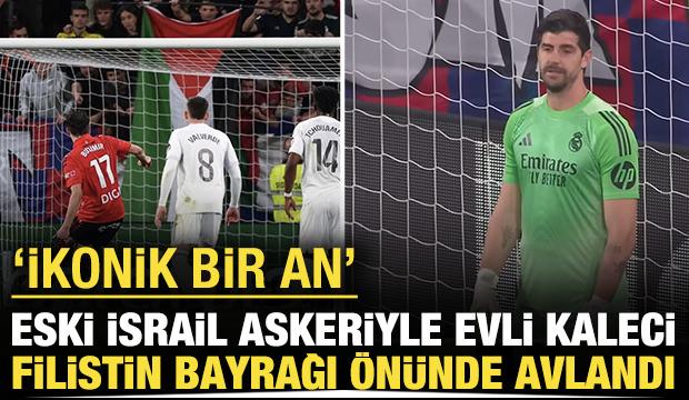 Eski bir İsrail askeriyle evli olan kaleci Filistin bayrağı &ouml;n&uuml;nde avlandı: İkonik bir an