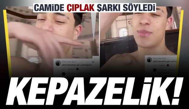 B&uuml;y&uuml;k saygısızlık: &Uuml;st&uuml; &ccedil;ıplak camiye girip k&uuml;f&uuml;rl&uuml; rap şarkısı dinledi