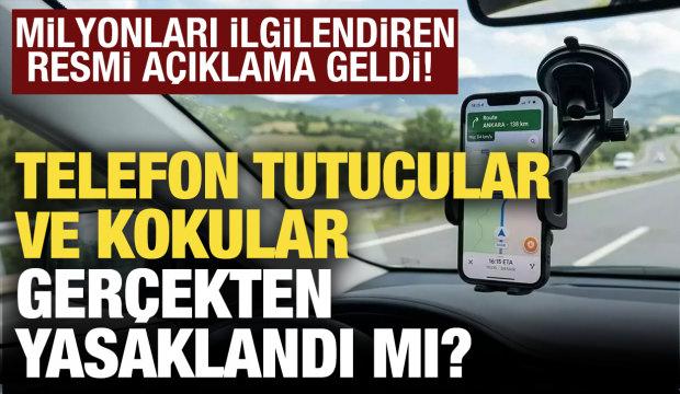 Otomobillerde telefon tutucular yasaklandı mı? Milyonları ilgilendiren a&ccedil;ıklama