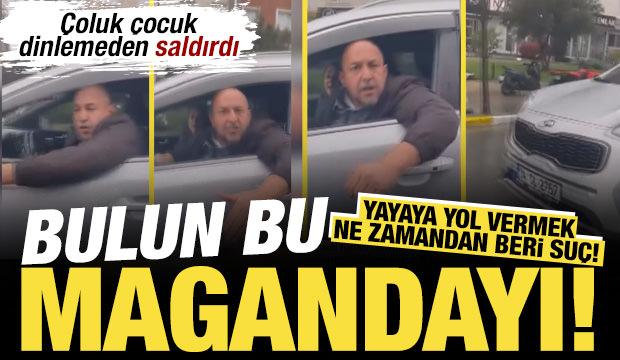 &lsquo;Yayaya yol verdin&rsquo; diye ter&ouml;r estirdi: '&Ccedil;ocuğum var' feryadını duymadı, aracına saldırdı