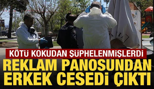 K&ouml;t&uuml; kokunun sebebi şoke etti: Reklam panosunda erkek cesedi!