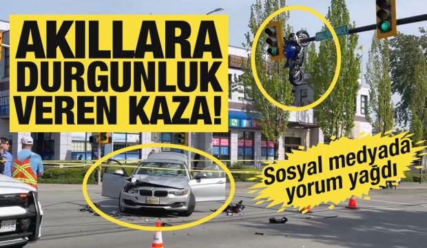 Kanada'da kazaya karışan motosiklet trafik lambasında asılı kaldı