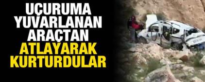 300 metrelik u&ccedil;uruma yuvarlanan ara&ccedil;tan son anda atlayarak kurtuldular