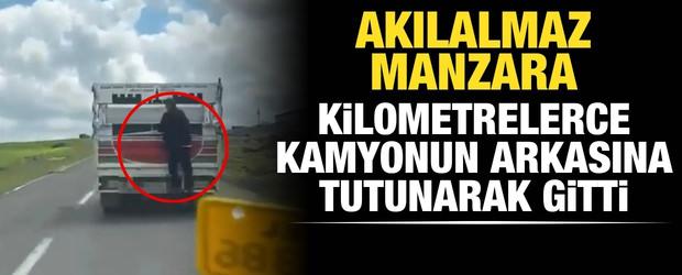 Kamyonete tutunarak kilometrelerce yol aldı