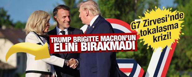 G7 Zirvesi'nde tokalaşma krizi: Trump Brigitte Macron'un elini bırakmadı