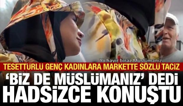 Tesett&uuml;rl&uuml; kadının kıyafetine karıştı: Hadsiz s&ouml;zler, tepki &ccedil;ekti