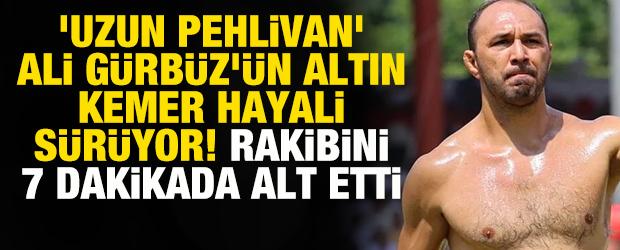 'Uzun pehlivan' Ali G&uuml;rb&uuml;z'&uuml;n altın kemer hayali s&uuml;r&uuml;yor! Rakibini 7 dakikada alt etti