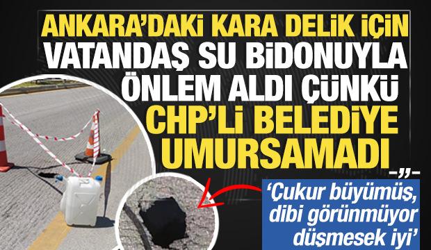 Ankara'daki 'kara delik' i&ccedil;in su bidonuyla &ouml;nlem alındı: 'Dibi g&ouml;r&uuml;nm&uuml;yor d&uuml;şmesek iyi'