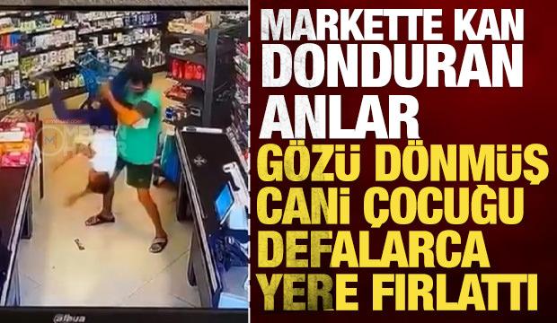 Markette kan donduran anlar: G&ouml;z&uuml; d&ouml;nm&uuml;ş cani &ccedil;ocuğu defalarca yere fırlattı