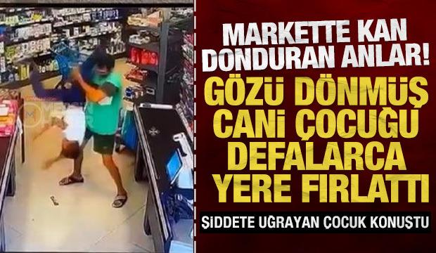 Markette kan donduran anlar: G&ouml;z&uuml; d&ouml;nm&uuml;ş cani &ccedil;ocuğu defalarca yere fırlattı