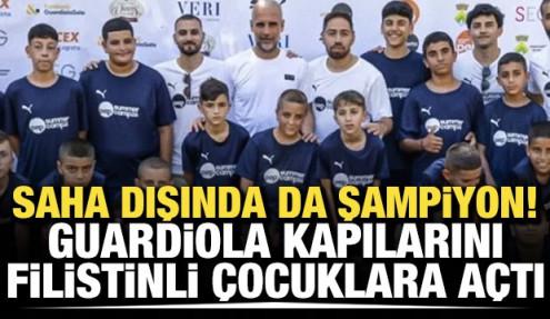 Saha dışında da şampiyon! Guardiola kapılarını Filistinli &ccedil;ocuklara a&ccedil;tı
