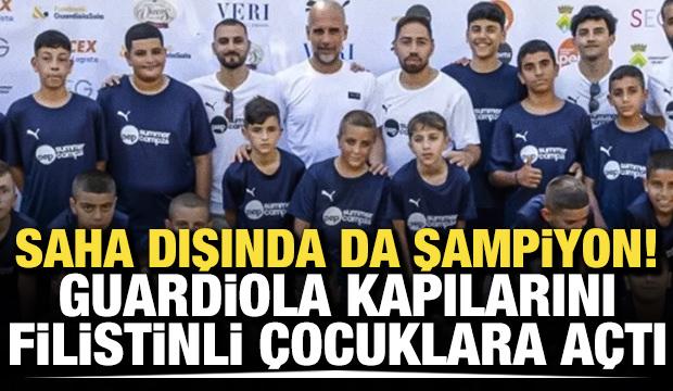 Saha dışında da şampiyon! Guardiola kapılarını Filistinli &ccedil;ocuklara a&ccedil;tı