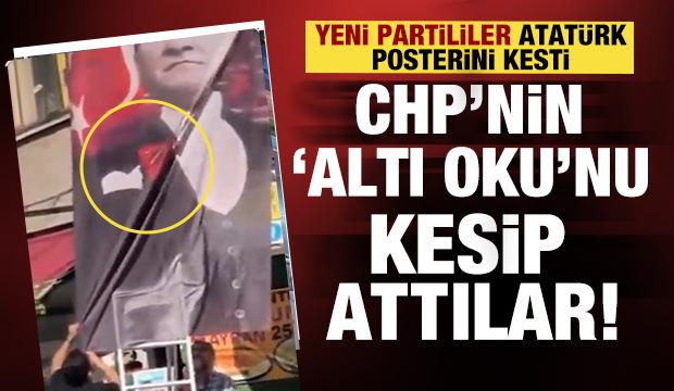Yeni parti binasında Atat&uuml;rk posterindeki Altıok amblemine bı&ccedil;akla kestiler