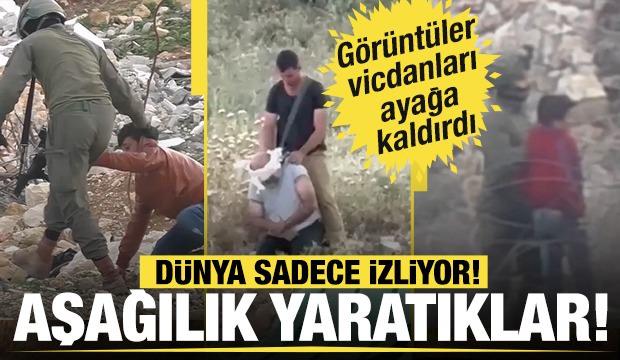 Batı Şeria'da Siyonist işgalcilerin zulm&uuml; kamerada! Ka&ccedil;ırıp g&ouml;zlerini bağladılar