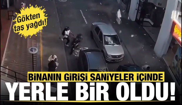 Deprem anında binanın girişi saniyeler i&ccedil;inde yerle bir oldu