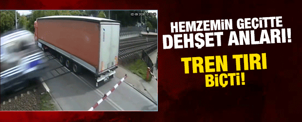 Hemzemin ge&ccedil;itte sıkışan tırı tren bi&ccedil;ti!