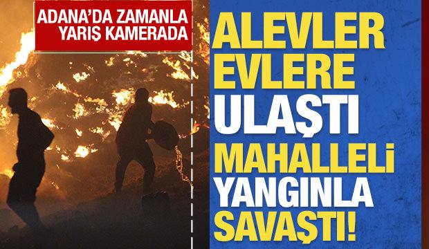 Adana'da alevler evlere ulaştı: Mahalleli yangınla savaştı