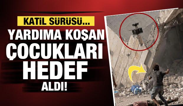 Katil İsrail yaralıya yardıma koşan &ccedil;ocukları hedef aldı
