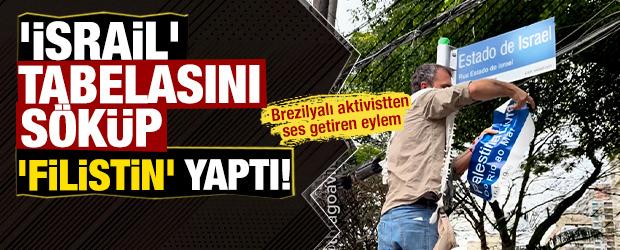 Brezilyalı aktivistten ses getiren eylem: 'İsrail' tabelasını s&ouml;k&uuml;p 'Filistin' yaptı!