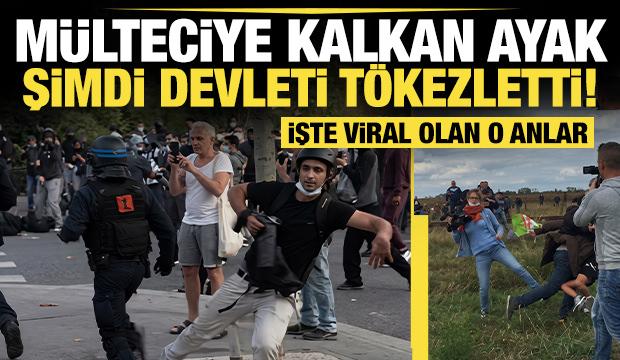 Fransa'daki eylemlerde polise &ccedil;elme takan fotoğraf&ccedil;ı o utan&ccedil; anını hatırlattı