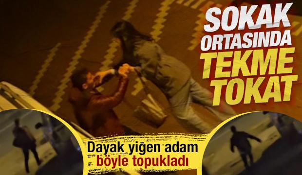 Sokak ortasında tekme tokat dayak: Kadın apartmana girince dayak yiyen adam koşarak ka&ccedil;tı